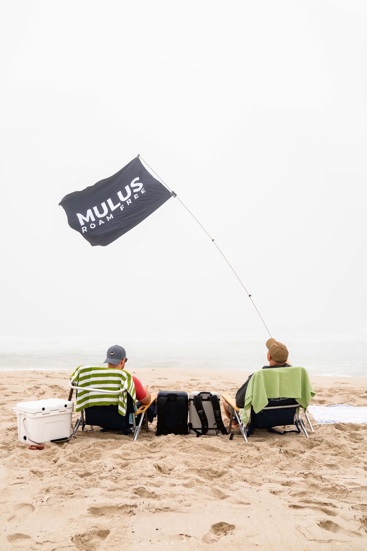 MULUS Roam Free flag flying at the beach